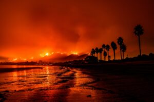 Image of a california wildfire near a beach
